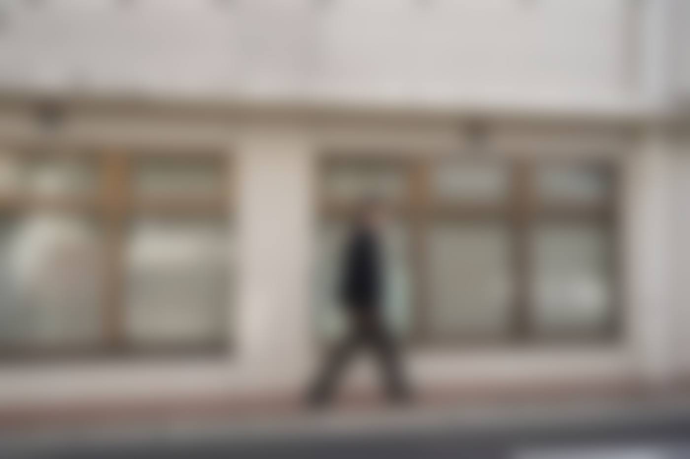 Walking, tiled facade